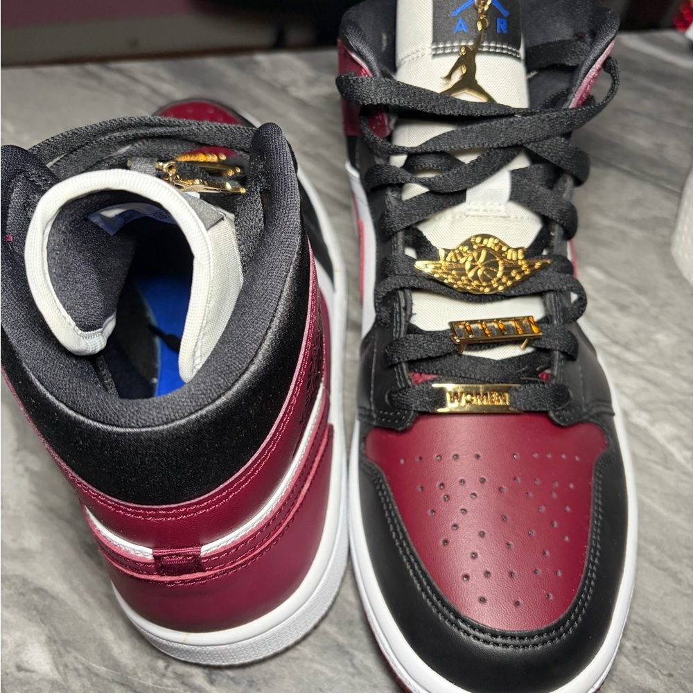 Jordan Women's Sneakers in Black, Burgundy, and Gold
